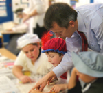 Photo of Teacher and pupils